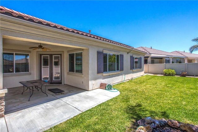 967 Hidden Oaks, Beaumont, CA 92223 - rear view of house with a ceiling fan, stucco siding, and a patio