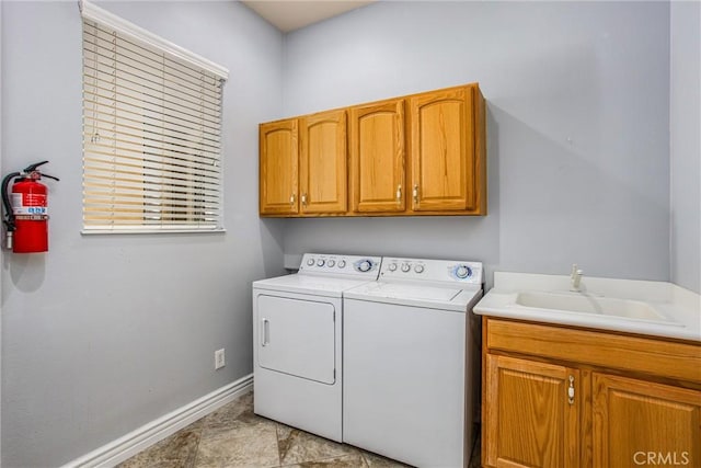 967 Hidden Oaks, Beaumont, CA 92223 - washroom featuring cabinet space, washer and clothes dryer, and baseboards