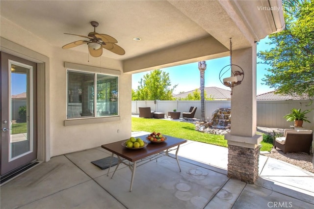 967 Hidden Oaks, Beaumont, CA 92223 - fenced backyard with a patio area and ceiling fan