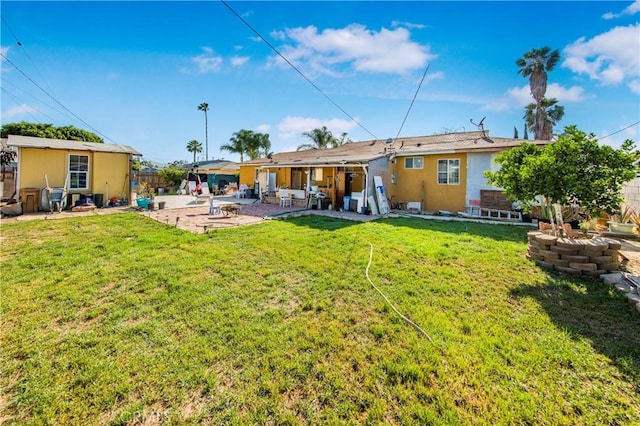 10636 Wolfe Ave, Riverside, CA 92505 - back of property featuring a patio and stucco siding