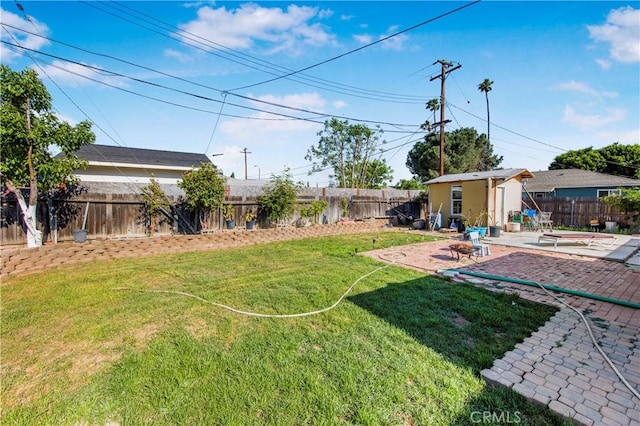 10636 Wolfe Ave, Riverside, CA 92505 - view of yard with an outbuilding and a patio area
