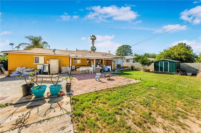 10636 Wolfe Ave, Riverside, CA 92505 - back of property featuring a patio area and stucco siding
