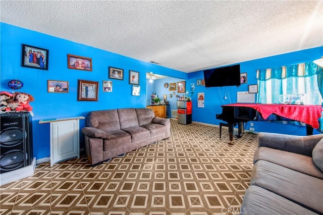 10636 Wolfe Ave, Riverside, CA 92505 - living room with baseboards and a textured ceiling