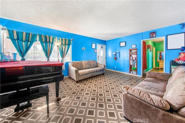 10636 Wolfe Ave, Riverside, CA 92505 - living room featuring baseboards and a textured ceiling
