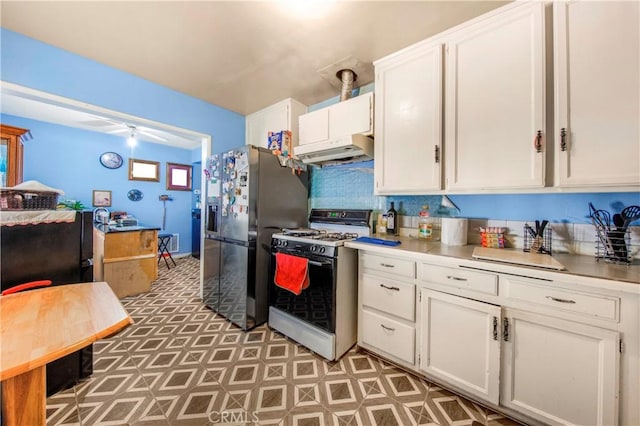 10636 Wolfe Ave, Riverside, CA 92505 - kitchen featuring gas stove, fridge with ice dispenser, white cabinets, under cabinet range hood, and light countertops