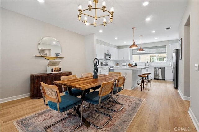 3516 Brody Way, Oceanside, CA 92056 - dining area with a chandelier, light wood-style flooring, baseboards, and recessed lighting
