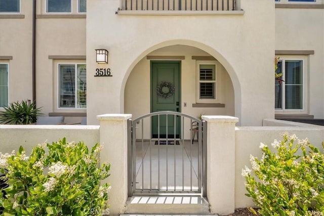 3516 Brody Way, Oceanside, CA 92056 - view of exterior entry featuring stucco siding and a gate