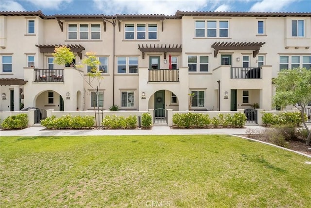 3516 Brody Way, Oceanside, CA 92056 - view of front of home featuring a gate, stucco siding, and a balcony
