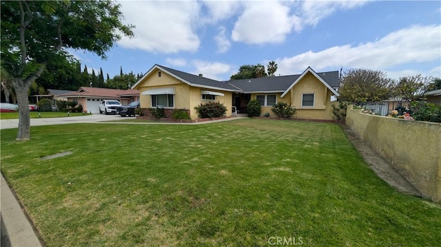 8437 Everest St, Downey, CA 90242 - ranch-style house with concrete driveway, stucco siding, and an attached garage