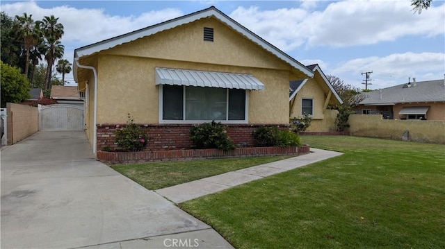 8437 Everest St, Downey, CA 90242 - bungalow-style home with a gate, brick siding, and stucco siding