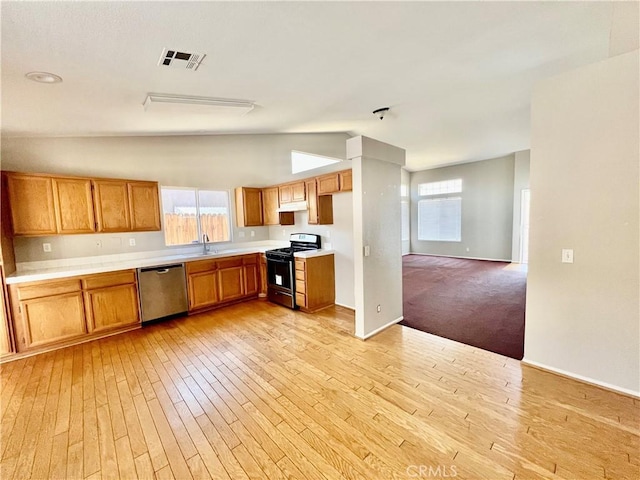 13633 Bentwood St, Hesperia, CA 92344 - kitchen with range with gas cooktop, dishwasher, vaulted ceiling, light wood-style flooring, and light countertops
