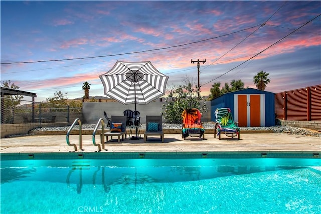 5536 Cahuilla Ave Unit 29, Palms, CA 92277 - outdoor pool featuring a fenced backyard and a patio area