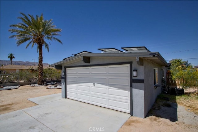 5536 Cahuilla Ave Unit 29, Palms, CA 92277 - detached garage featuring a mountain view
