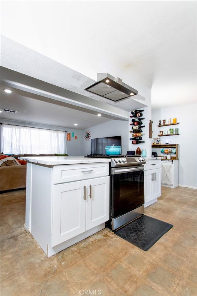 5536 Cahuilla Ave Unit 29, Palms, CA 92277 - kitchen featuring open floor plan, stainless steel range oven, white cabinets, wall chimney range hood, and recessed lighting