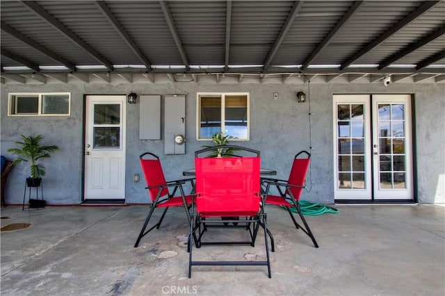 5536 Cahuilla Ave Unit 29, Palms, CA 92277 - view of patio / terrace featuring outdoor dining area and french doors