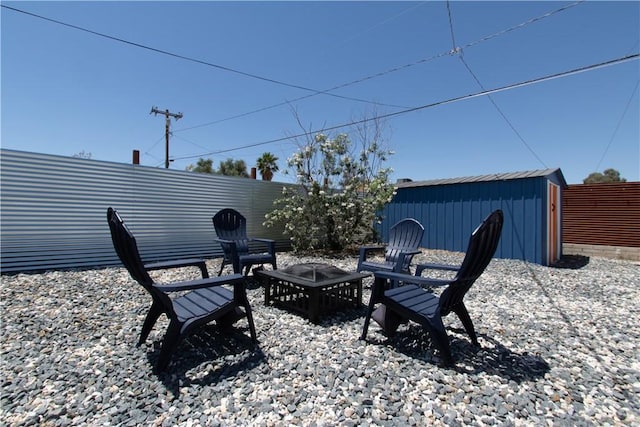 5536 Cahuilla Ave Unit 29, Palms, CA 92277 - view of patio / terrace featuring an outdoor fire pit