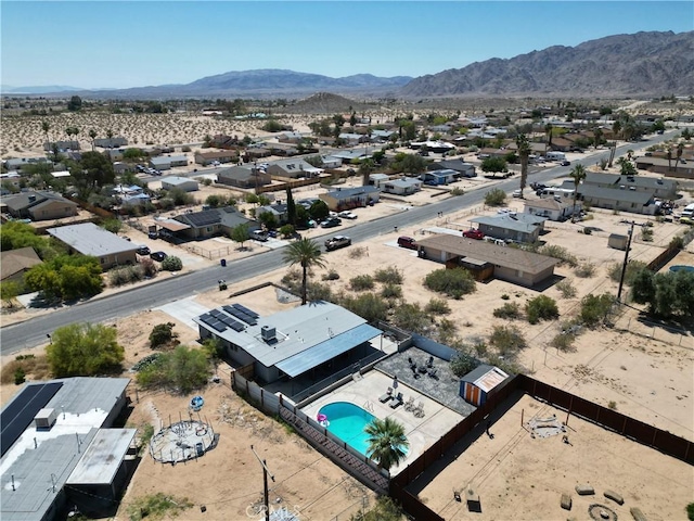 5536 Cahuilla Ave Unit 29, Palms, CA 92277 - aerial view of residential area with mountains and a pool area