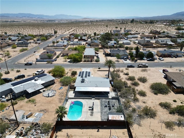 5536 Cahuilla Ave Unit 29, Palms, CA 92277 - aerial perspective of suburban area with a mountainous background
