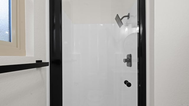 1524 Bridgeview Dr, San Diego, CA 92105 - bathroom view of a shower and a textured wall