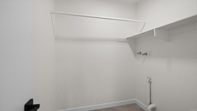 1524 Bridgeview Dr, San Diego, CA 92105 - washroom with washer hookup and baseboards