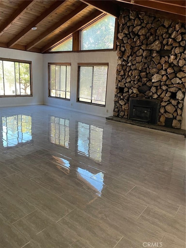 9275 Sheep Ranch Rd, Mountain Ranch, CA 95246 - unfurnished living room featuring wooden ceiling with exposed beams and high vaulted ceiling