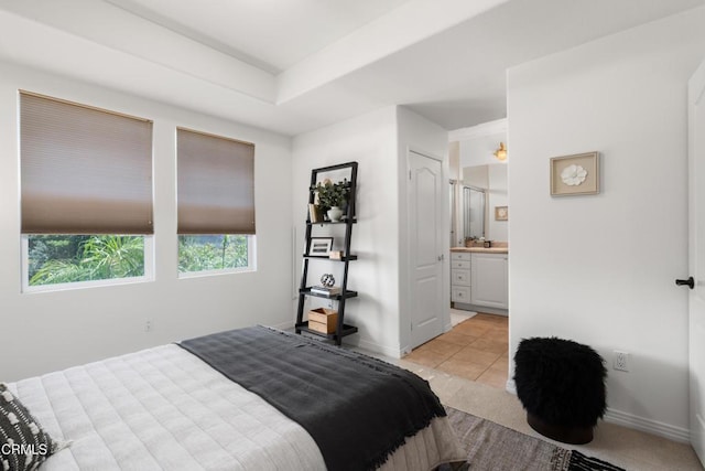 433 N Altadena Dr Unit 4, Pasadena, CA 91107 - bedroom with light tile patterned floors, baseboards, and ensuite bath