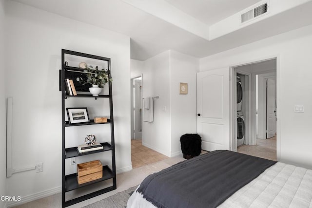 433 N Altadena Dr Unit 4, Pasadena, CA 91107 - bedroom featuring stacked washing machine and dryer and baseboards