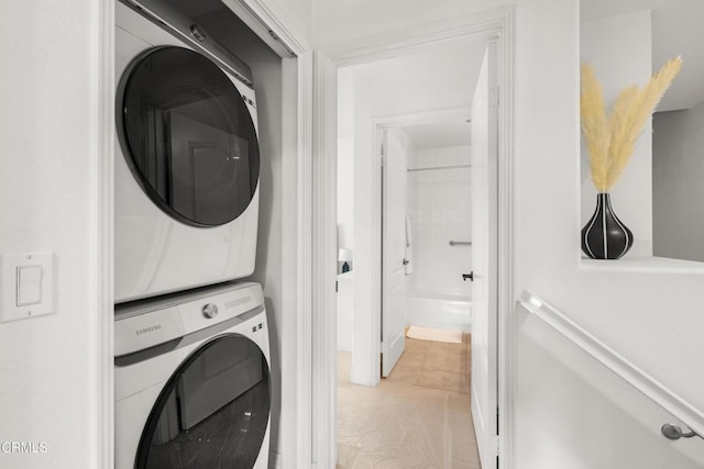 433 N Altadena Dr Unit 4, Pasadena, CA 91107 - laundry room with stacked washer and clothes dryer and light tile patterned floors