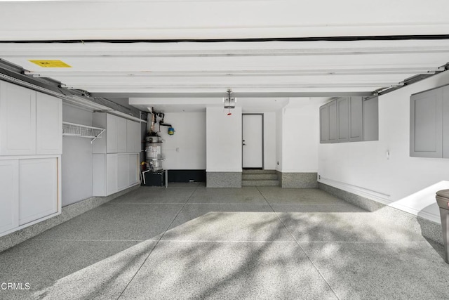 433 N Altadena Dr Unit 4, Pasadena, CA 91107 - garage featuring strapped water heater and baseboards