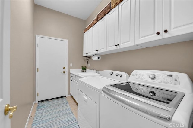 26716 Kingwood Rd, Murrieta, CA 92563 - laundry room featuring washer and clothes dryer, cabinet space, and baseboards