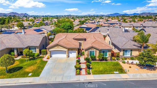26716 Kingwood Rd, Murrieta, CA 92563 - view of front of house with a residential view, an attached garage, stucco siding, and a tile roof