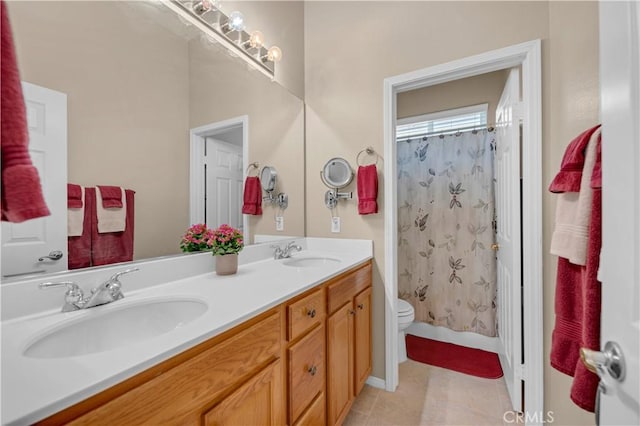 26716 Kingwood Rd, Murrieta, CA 92563 - full bathroom with double vanity, tile patterned flooring, and toilet