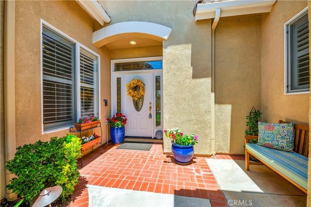 26716 Kingwood Rd, Murrieta, CA 92563 - view of exterior entry with stucco siding