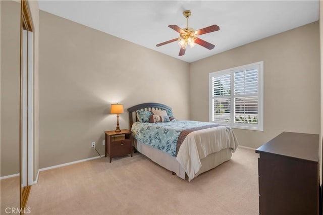 26716 Kingwood Rd, Murrieta, CA 92563 - bedroom with light colored carpet, baseboards, and a ceiling fan
