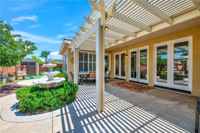26716 Kingwood Rd, Murrieta, CA 92563 - view of patio / terrace with french doors, a pergola, and a shed