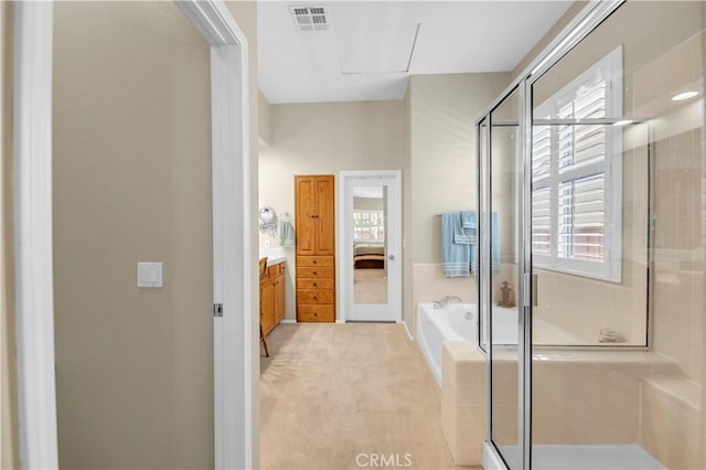 26716 Kingwood Rd, Murrieta, CA 92563 - ensuite bathroom featuring a stall shower, plenty of natural light, and a bath
