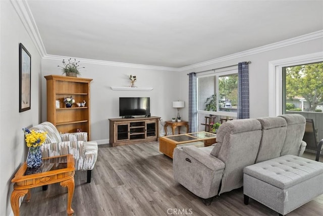 676 Via Alhambra Unit C, Laguna Woods, CA 92637 - living room featuring ornamental molding, wood finished floors, and baseboards