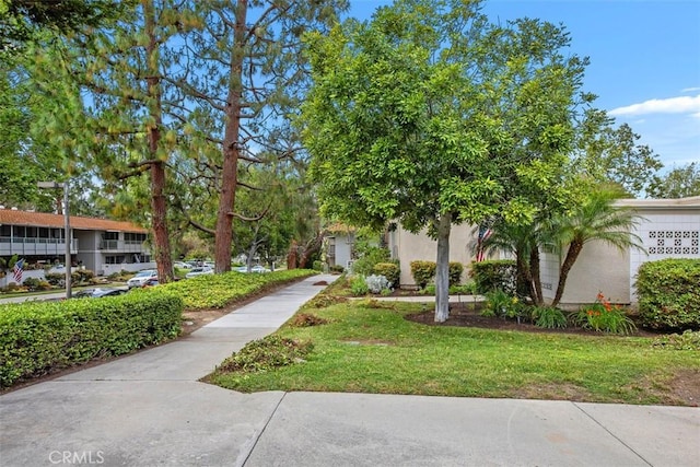 676 Via Alhambra Unit C, Laguna Woods, CA 92637 - view of community with a lawn