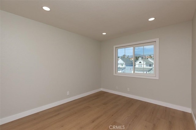 21981 Birchwood, Mission Viejo, CA 92692 - empty room with baseboards, light wood-type flooring, and recessed lighting