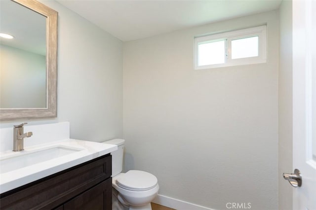 21981 Birchwood, Mission Viejo, CA 92692 - bathroom with toilet, vanity, and baseboards