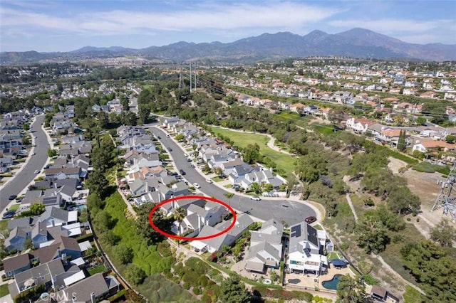 21981 Birchwood, Mission Viejo, CA 92692 - aerial view of property's location with nearby suburban area and a mountainous background