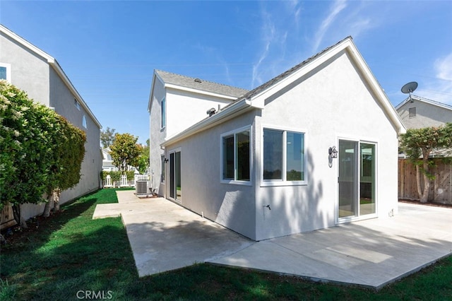 21981 Birchwood, Mission Viejo, CA 92692 - back of property featuring stucco siding, central air condition unit, and a patio area