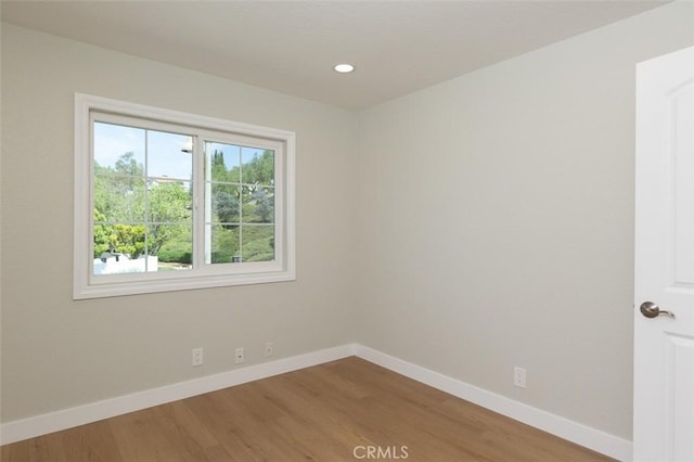 21981 Birchwood, Mission Viejo, CA 92692 - unfurnished room with baseboards, wood finished floors, and recessed lighting