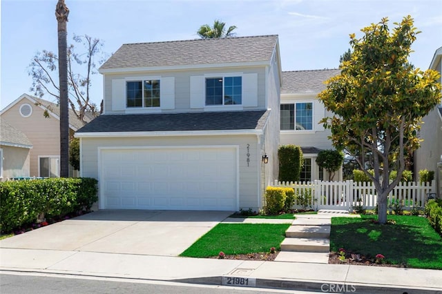 21981 Birchwood, Mission Viejo, CA 92692 - traditional-style house with a garage, driveway, and roof with shingles