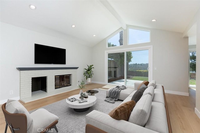 21981 Birchwood, Mission Viejo, CA 92692 - living room featuring light wood finished floors, plenty of natural light, a brick fireplace, baseboards, and recessed lighting