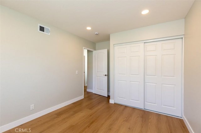 21981 Birchwood, Mission Viejo, CA 92692 - unfurnished bedroom with light wood-style flooring, baseboards, recessed lighting, and a closet