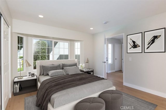 21981 Birchwood, Mission Viejo, CA 92692 - bedroom with multiple windows, wood finished floors, baseboards, and recessed lighting
