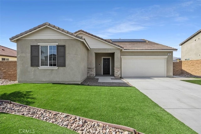 508 Bristolwood Rd, Hemet, CA 92543 - ranch-style home featuring a garage, roof mounted solar panels, driveway, stucco siding, and a tiled roof