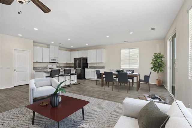 508 Bristolwood Rd, Hemet, CA 92543 - living area with wood finished floors, ceiling fan, and recessed lighting