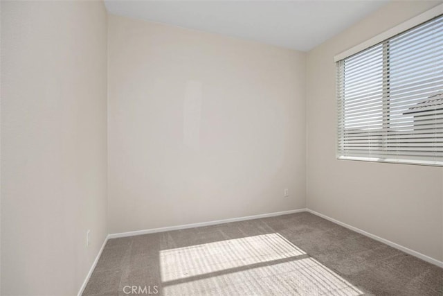 508 Bristolwood Rd, Hemet, CA 92543 - carpeted empty room featuring baseboards